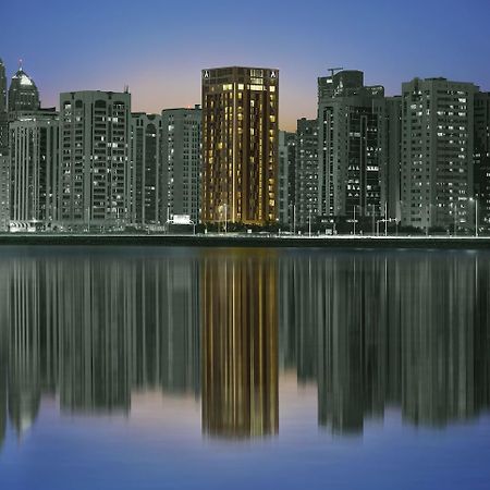 Hala Arjaan By Rotana, Deluxe Hotel Apartments Абу-Даби Экстерьер фото