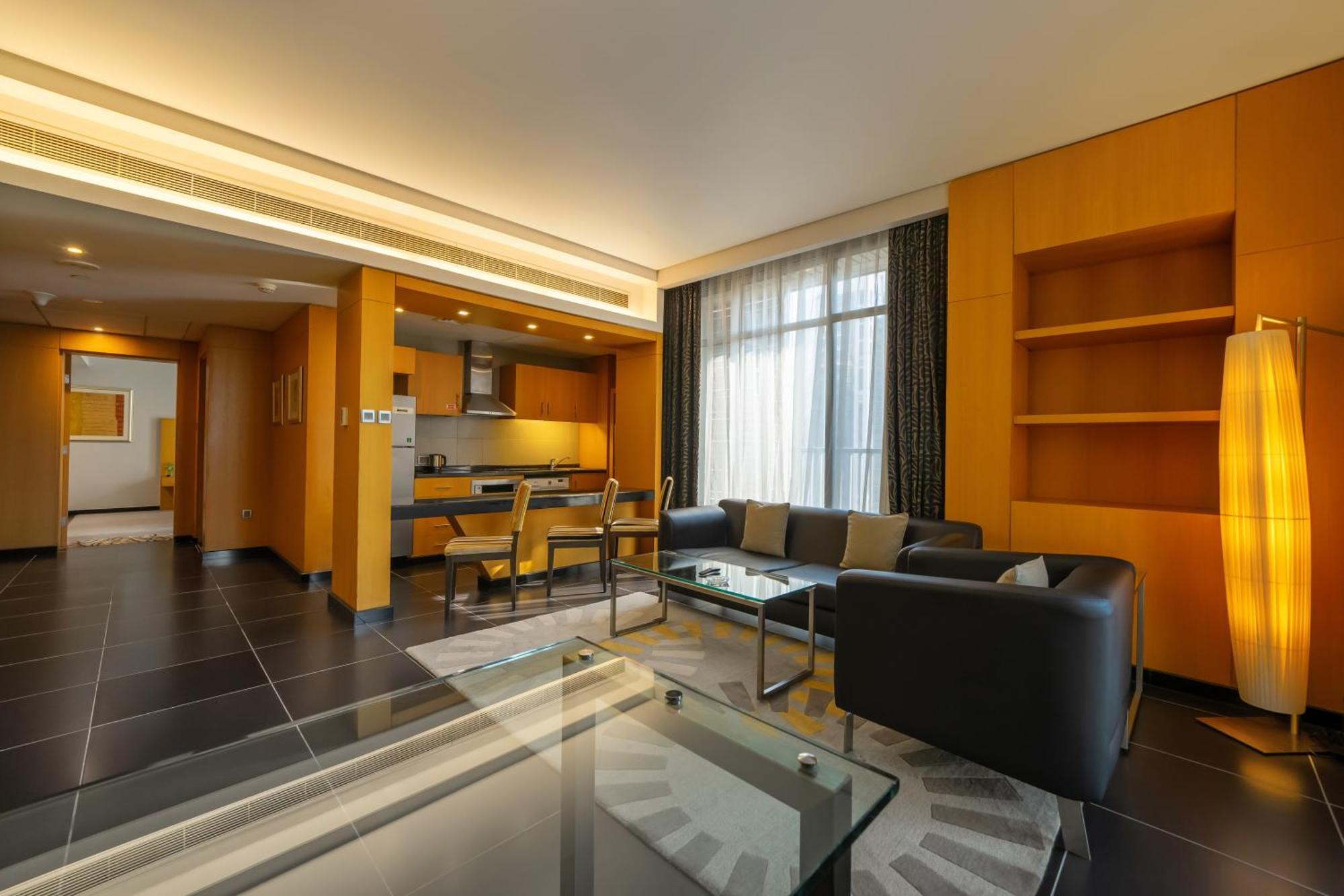 Hala Arjaan By Rotana, Deluxe Hotel Apartments Абу-Даби Экстерьер фото