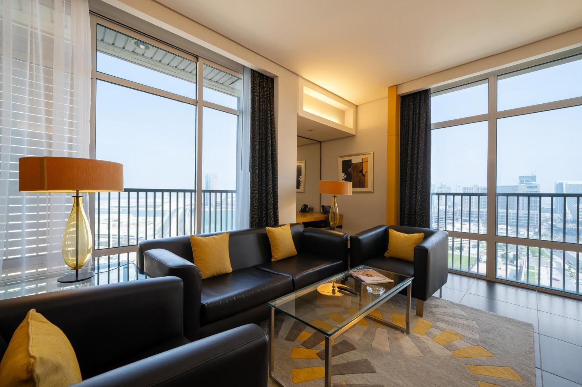 Hala Arjaan By Rotana, Deluxe Hotel Apartments Абу-Даби Экстерьер фото