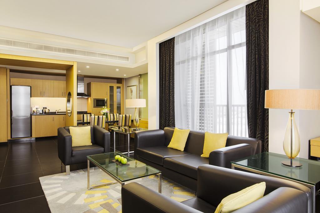 Hala Arjaan By Rotana, Deluxe Hotel Apartments Абу-Даби Экстерьер фото